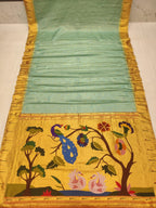 Decorative fabric with peacock design on a yellow background