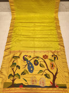 Yellow fabric with floral and peacock design